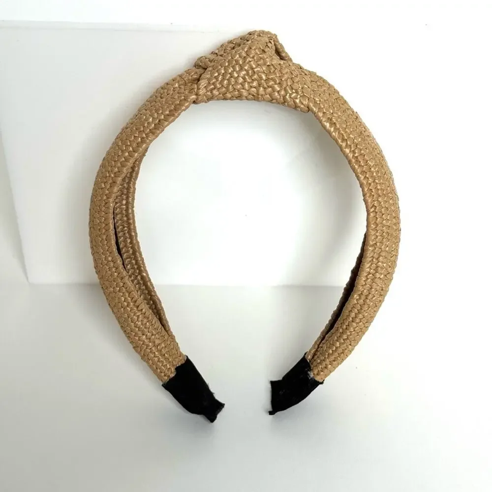 Women’s rare Eugenia Kim Rafia, knot headband Purchased at Henry Bendel/Like New